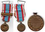Médaille accompagnant le diplome de la medaille commemorative